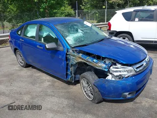 2010 Ford Focus SE z VIN 1FAHP3FNXAW168235, wystawiony jako IAAI lot #42091111 z przebiegiem 64 198 mil mil oraz . Historia ofert i sprzedaży dostępna na DreamBid. Obrazek 1.