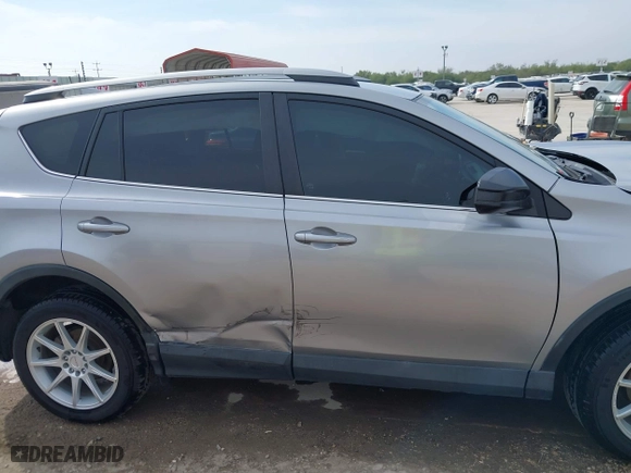 2018 Toyota RAV4 LE with VIN 2T3ZFREV2JW464807, listed as a IAAI auction lot 40966277 with 113,053 mi miles. Bid and sale history available at carsss.com. Image 14.