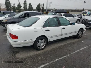 1997 Mercedes-Benz E-Class with VIN WDBJF72F2VA099305, listed as a Copart auction lot 48007935 with 96,410 mi miles and Salvage Title. Bid and sale history available at carsss.com. Image 3.