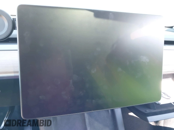 2023 Tesla Model Y Long Range with VIN 7SAYGAEE7PF971620, listed as a IAAI auction lot 41654688 with Not Provided miles and . Bid and sale history available at DreamBid. Image 18.