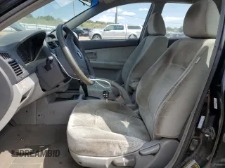 2006 Kia Spectra EX with VIN KNAFE121065348140, listed as a Copart auction lot 70874144 with 181,710 mi miles and Salvage Title. Bid and sale history available at carsss.com. Image 7.