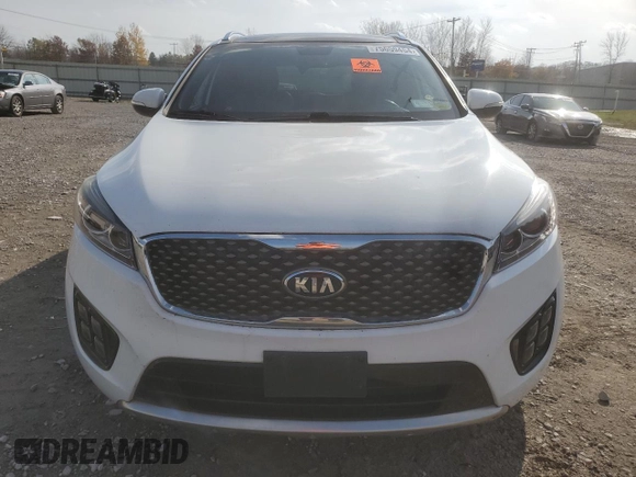 2016 Kia Sorento SXL z VIN 5XYPKDA16GG102852, wystawiony jako Copart lot #75659454 z przebiegiem Nie podano mil oraz Nie do naprawy • Non repairable. Historia ofert i sprzedaży dostępna na DreamBid. Obrazek 5.