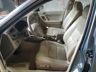 2000 Mazda Millenia z VIN JM1TA2212Y1610919, wystawiony jako Copart lot #80375014 z przebiegiem 127 938 mil mil oraz Szkody całkowita. Historia ofert i sprzedaży dostępna na DreamBid. Obrazek 7.