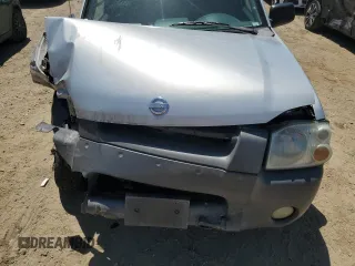 2002 Nissan Frontier XE z VIN 1N6ED29X72C374187, wystawiony jako Copart lot #55688645 z przebiegiem 354 656 mil mil oraz Szkoda całkowita • Salvage title. Historia ofert i sprzedaży dostępna na DreamBid. Obrazek 11.