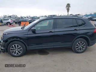 2021 Volkswagen Tiguan S with VIN 3VV1B7AX4MM025586, listed as a IAAI auction lot 41889996 with 21,777 mi miles and . Bid and sale history available at DreamBid. Image 14.