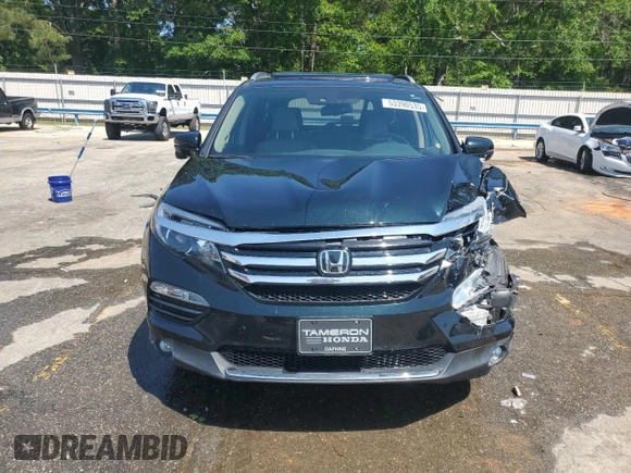 2017 Honda Pilot Touring z VIN 5FNYF6H93HB051982, wystawiony jako Copart lot #53390535 z przebiegiem Nie podano mil oraz Szkoda całkowita • Salvage title. Historia ofert i sprzedaży dostępna na DreamBid. Obrazek 5.