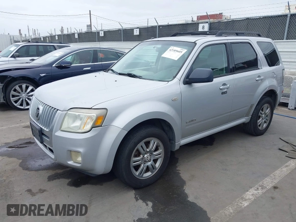 2008 Mercury Mariner with VIN 4M2CU81148KJ26119, listed as a IAAI auction lot 42189605 with 144,816 mi miles and . Bid and sale history available at DreamBid. Image 2.