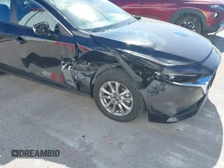 2021 Mazda 3 S z VIN JM1BPAAL4M1333238, wystawiony jako IAAI lot #40532801 z przebiegiem 33 538 mil mil oraz . Historia ofert i sprzedaży dostępna na DreamBid. Obrazek 6.