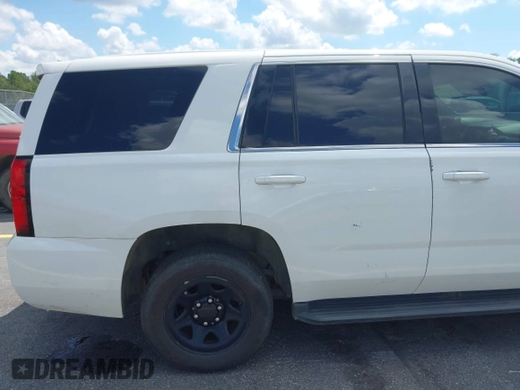 2018 Chevrolet Tahoe Commercial z VIN 1GNLCDEC1JR155210, wystawiony jako IAAI lot #42845068 z przebiegiem 159 456 mil mil oraz . Historia ofert i sprzedaży dostępna na DreamBid. Obrazek 18.