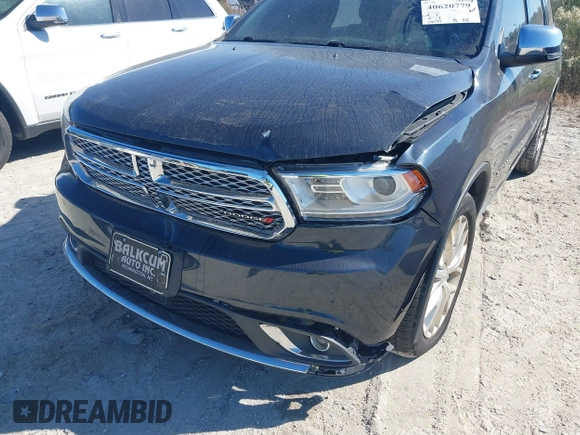 2014 Dodge Durango Citadel with VIN 1C4SDJETXEC390326, listed as a IAAI auction lot 40620779 with 119,537 mi miles and . Bid and sale history available at DreamBid. Image 6.