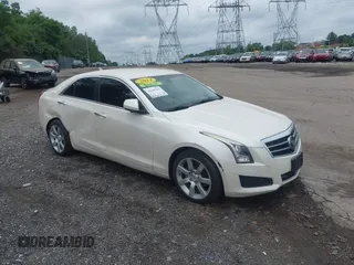 2014 Cadillac ATS Standard RWD with VIN 1G6AA5RA5E0173517, listed as a IAAI auction lot 42540181 with 73,732 mi miles and . Bid and sale history available at DreamBid. Image 1.