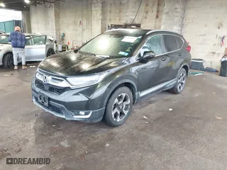 2018 Honda CR-V Touring with VIN 2HKRW2H96JH604497, listed as a IAAI auction lot 41007064 with 38,566 mi miles. Bid and sale history available at carsss.com. Image 17.