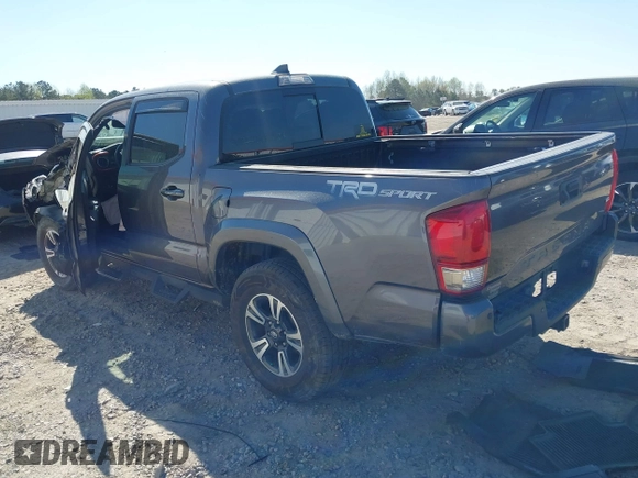 2017 Toyota Tacoma SR5 with VIN 5TFAZ5CN7HX033594, listed as a IAAI auction lot 41881117 with 86,676 mi miles and . Bid and sale history available at DreamBid. Image 3.