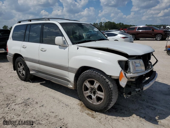 2000 Toyota Land Cruiser with VIN JT3HT05JXY0119718, listed as a Copart auction lot 71632754 with 306,887 mi miles and Salvage Title. Bid and sale history available at carsss.com. Image 4.