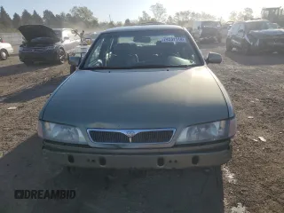 2002 Infiniti G20 Luxury z VIN JNKCP11AX2T509549, wystawiony jako Copart lot #74531114 z przebiegiem 158 364 mil mil oraz Szkody całkowita. Historia ofert i sprzedaży dostępna na DreamBid. Obrazek 5.