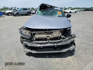 2022 Honda Civic Sport z VIN 2HGFE2F54NH515517, wystawiony jako Copart lot #54695585 z przebiegiem Nie podano mil oraz Szkoda całkowita • Salvage title. Historia ofert i sprzedaży dostępna na DreamBid. Obrazek 14.