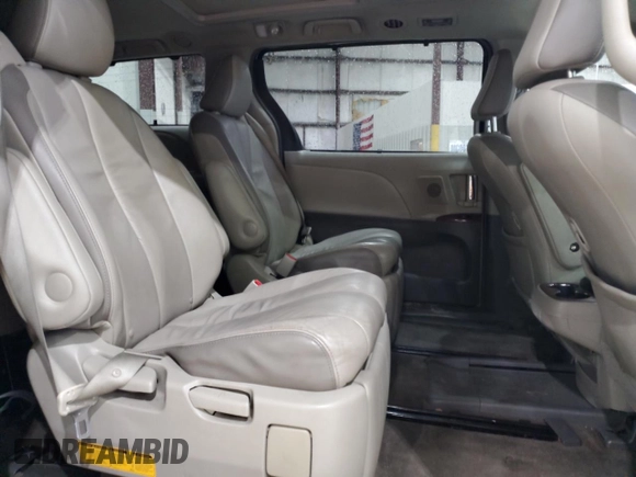 2014 Toyota Sienna Limited z VIN 5TDDK3DC1ES086604, wystawiony jako Copart lot #57044175 z przebiegiem 152 326 mil mil oraz Nie do naprawy • Non repairable. Historia ofert i sprzedaży dostępna na DreamBid. Obrazek 11.