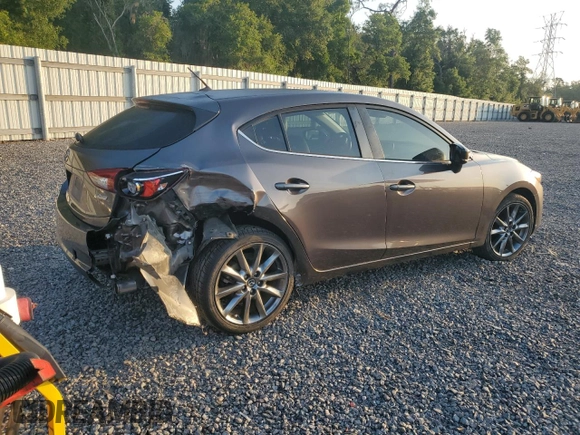 2018 Mazda 3 Touring z VIN 3MZBN1L33JM235106, wystawiony jako Copart lot #58272365 z przebiegiem 28 844 mil mil oraz Szkoda całkowita • Salvage title. Historia ofert i sprzedaży dostępna na DreamBid. Obrazek 3.