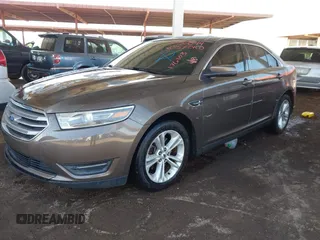 2015 Ford Taurus SEL with VIN 1FAHP2H87FG176103, listed as a IAAI auction lot 41950844 with 205,014 mi miles. Bid and sale history available at carsss.com. Image 2.