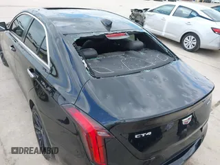 2021 Cadillac CT4 Luxury z VIN 1G6DK5RK6M0106605, wystawiony jako IAAI lot #42037889 z przebiegiem 50 236 mil mil oraz . Historia ofert i sprzedaży dostępna na DreamBid. Obrazek 17.