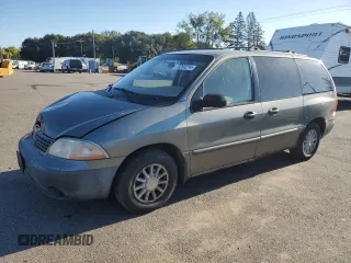 2001 Ford Windstar Wagon LX with VIN 2FMZA51441BA35669, listed as a Copart auction lot 73283214 with 240,538 mi miles and Salvage Title. Bid and sale history available at carsss.com. Image 1.