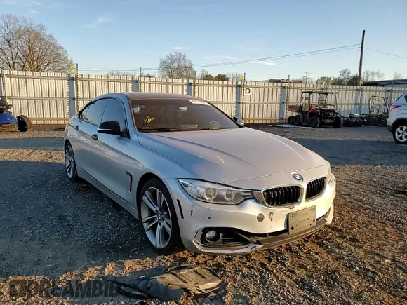 2015 BMW 4 Series 428i z VIN WBA4A5C51FG052009, wystawiony jako Copart lot #89110235 z przebiegiem 156 675 mil mil oraz Szkoda całkowita • Salvage title. Historia ofert i sprzedaży dostępna na DreamBid. Obrazek 10.