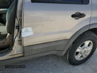 2001 Ford Escape XLT with VIN 1FMCU04101KF61126, listed as a Copart auction lot 76174744 with 0 mi miles and Salvage Title. Bid and sale history available at carsss.com. Image 13.