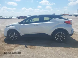 2019 Toyota C-HR XLE z VIN JTNKHMBX8K1061351, wystawiony jako IAAI lot #42053354 z przebiegiem 76 000 mil mil oraz . Historia ofert i sprzedaży dostępna na DreamBid. Obrazek 14.