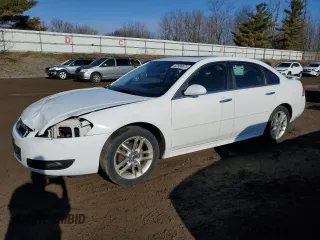 2014 Chevrolet Impala LTZ with VIN 2G1WC5E37E1186982, listed as a Copart auction lot 52500675 with 162,692 mi miles and Salvage Title. Bid and sale history available at DreamBid. Image 1.