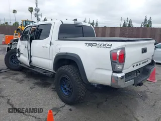 2023 Toyota Tacoma 4WD SR with VIN 3TMCZ5AN0PM550641, listed as a IAAI auction lot 41929355 with 18,917 mi miles. Bid and sale history available at carsss.com. Image 3.