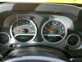 2009 Jeep Wrangler Rubicon with VIN 1J4GA64109L707008, listed as a Copart auction lot 87492674 with 157,104 mi miles and Salvage Title. Bid and sale history available at DreamBid. Image 9.