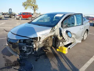 2021 Toyota Prius LE with VIN JTDKAMFP1M3196066, listed as a IAAI auction lot 41752179 with 90,200 mi miles and . Bid and sale history available at DreamBid. Image 18.