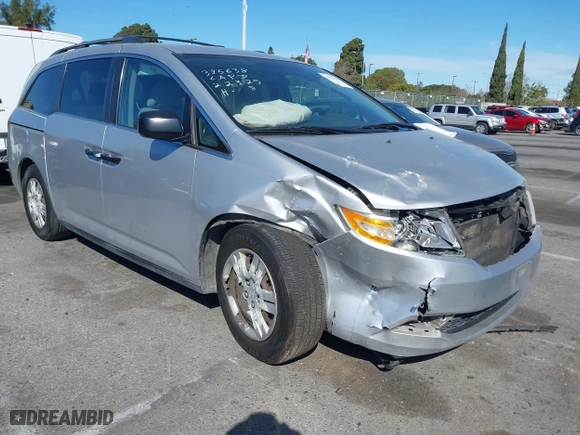 2013 Honda Odyssey LX with VIN 5FNRL5H2XDB065141, listed as a IAAI auction lot 41712328 with 174,020 mi miles. Bid and sale history available at carsss.com. Image 1.