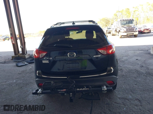 2013 Mazda CX-5 Grand Touring with VIN JM3KE2DE4D0127827, listed as a IAAI auction lot 41817214 with 108,295 mi miles. Bid and sale history available at carsss.com. Image 16.