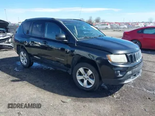 2014 Jeep Compass Sport with VIN 1C4NJCBB1ED587005, listed as a IAAI auction lot 41706302 with 184,419 mi miles. Bid and sale history available at carsss.com. Image 1.