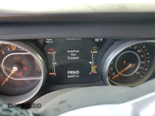2018 Jeep Wrangler Unlimited Sahara with VIN 1C4HJXEG5JW294430, listed as a Copart auction lot 52487495 with 86,609 mi miles and Salvage title. Bid and sale history available at DreamBid. Image 9.