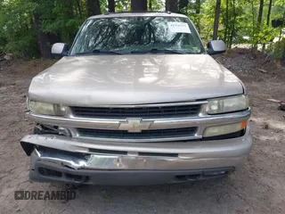 2005 Chevrolet Tahoe LS z VIN 1GNEK13T45J167997, wystawiony jako IAAI lot #42298160 z przebiegiem 142 981 mil mil oraz . Historia ofert i sprzedaży dostępna na DreamBid. Obrazek 12.