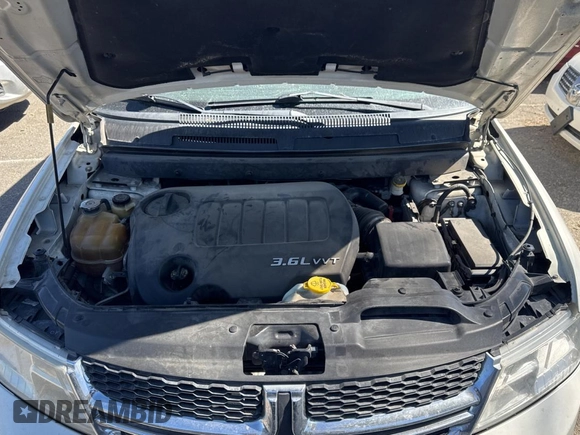2012 Dodge Journey SXT with VIN 3C4PDDBG6CT249396, listed as a Copart auction lot 74334824 with 158,628 mi miles and Clean title. Bid and sale history available at DreamBid. Image 7.
