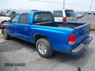 2001 Dodge Dakota Sport z VIN 1B7GL2AN31S115001, wystawiony jako IAAI lot #42452634 z przebiegiem Nie podano mil oraz . Historia ofert i sprzedaży dostępna na DreamBid. Obrazek 3.