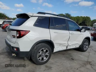 2023 Honda Passport TrailSport with VIN 5FNYF8H6XPB026464, listed as a Copart auction lot 52736395 with 14,281 mi miles and Salvage title. Bid and sale history available at DreamBid. Image 3.