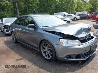 2013 Volkswagen Jetta S with VIN 3VW1K7AJ9DM261383, listed as a IAAI auction lot 42400220 with 192,965 mi miles and . Bid and sale history available at DreamBid. Image 1.