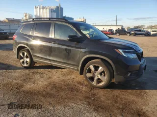 2021 Honda Passport Touring with VIN 5FNYF8H98MB019552, listed as a Copart auction lot 80360194 with 39,173 mi miles and Salvage Title. Bid and sale history available at carsss.com. Image 4.