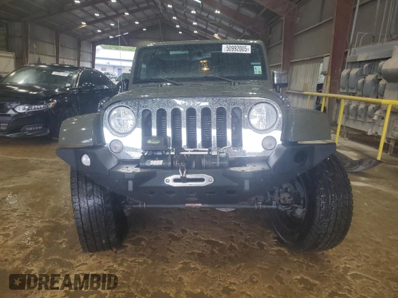 2015 Jeep Wrangler Unlimited Sahara with VIN 1C4HJWEG2FL639593, listed as a Copart auction lot 50992005 with 59,493 mi miles and Salvage Title. Bid and sale history available at carsss.com. Image 5.
