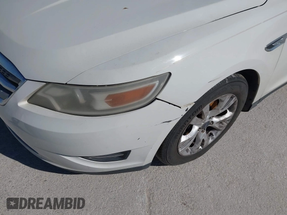 2012 Ford Taurus SEL with VIN 1FAHP2EW0CG108336, listed as a IAAI auction lot 41801077 with 229,387 mi miles and . Bid and sale history available at DreamBid. Image 6.