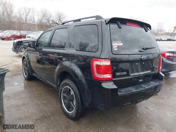 2011 Ford Escape XLT with VIN 1FMCU9DG7BKB03271, listed as a IAAI auction lot 41711731 with 139,135 mi miles. Bid and sale history available at carsss.com. Image 3.
