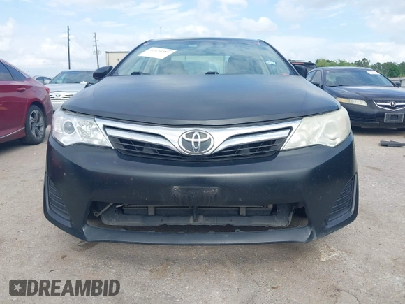 2014 Toyota Camry L with VIN 4T1BF1FK8EU468379, listed as a IAAI auction lot 42134387 with 101,603 mi miles and . Bid and sale history available at DreamBid. Image 6.