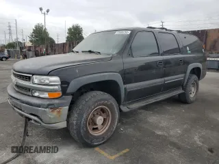 2001 Chevrolet Suburban LT with VIN 3GNGK26G41G211165, listed as a Copart auction lot 72488753 with 247,719 mi miles and Salvage title. Bid and sale history available at DreamBid. Image 1.