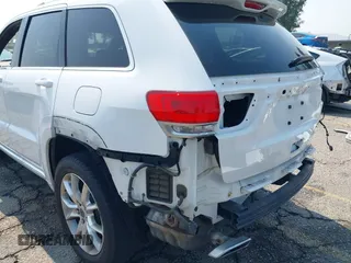 2015 Jeep Grand Cherokee Summit with VIN 1C4RJEJG8FC232253, listed as a IAAI auction lot 42725115 with 133,600 mi miles and . Bid and sale history available at DreamBid. Image 18.