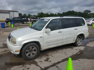 2002 Suzuki XL7 Standard z VIN JS3TY92V024106089, wystawiony jako Copart lot #58418685 z przebiegiem 232 254 mil mil oraz Szkoda całkowita • Salvage title. Historia ofert i sprzedaży dostępna na DreamBid. Obrazek 1.