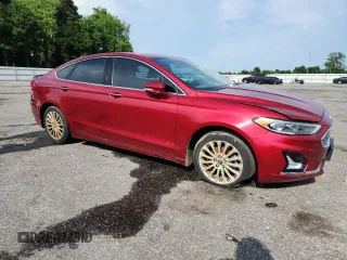 2019 Ford Fusion Titanium with VIN 3FA6P0D97KR225894, listed as a Copart auction lot 61340285 with 71,197 mi miles and Clean title. Bid and sale history available at DreamBid. Image 4.